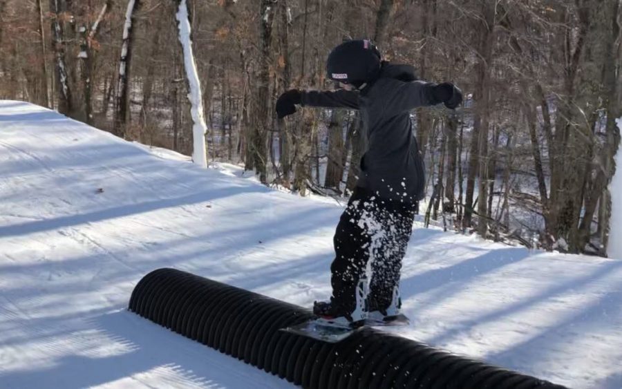 Krasavage completed a board slide at the terrain park at Nordic Mountain. At the park, snowboarders work on improving their skills and learning new things. When I snowboard with people that are better than me it makes me want to do more things,” Schultz said. 