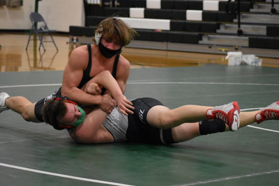 Junior Cade Martin wrestled against Kordell Hansen from the Princeton-Green Lake Tigersharks and won with a pin in the 182 class. Overall, Berlin lost against Princeton-Green Lake 18-42.
