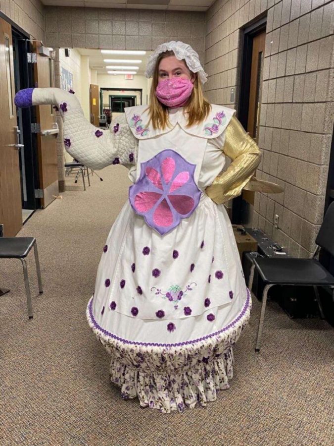 Senior Joanna Schmidt plays the role of Mrs. Pots.
With my character being a teapot I have a spout which is kind of like a puppet. It is connected to a shirt and I put my arm through it like a puppet. I also have Chips tea cart that I push whenever Chip is on stage, Schmidt said.