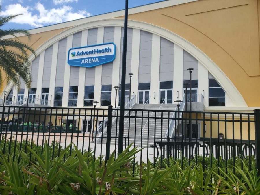 This is the East Blue Visa center. It is located up front on Disney ESPN grounds. For teams that get to preform in this building they are given a panel mat with springs under it for a stage, and loud music with the Summit logo on a huge banner behind the stage.