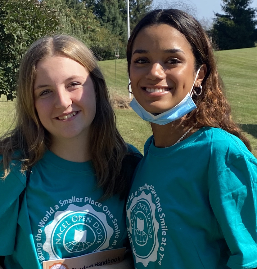 Left: Sarah Becker, Right: Ruth Illamedina pictured wearing their exchange program t-shirts, Nacel Open Doors. The two arrived in America on August 16. 