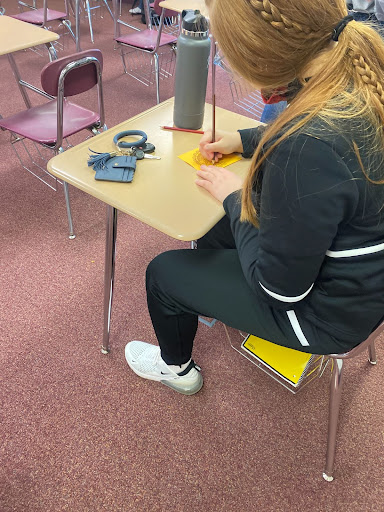 The KIND Committee set up this activity to spread positivity and remind people what they are thankful for. Students could only write something on their turkey school related. Junior Madison Mertens wrote that she is thankful for basketball on her turkey. 