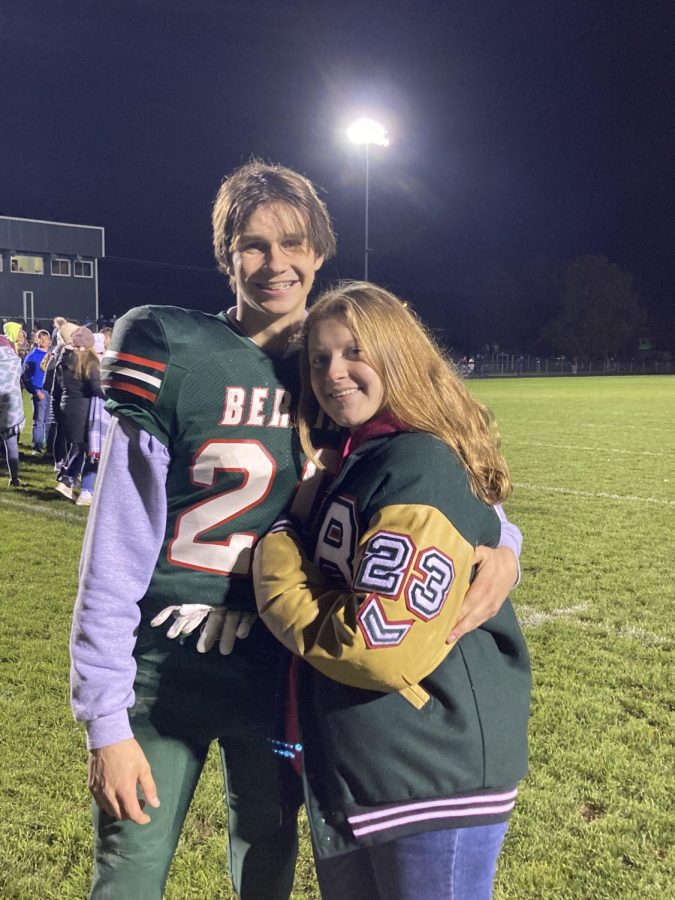 Senior+Ashley+Cottello+supports+junior+Isaiah+Krueger+during+his+football+games.+Cottello+went+to+all+of+the+games+to+cheer+him+on.+%E2%80%9CAshley+is+the+most+supportive+person+in+my+life%2C+she+has+always+been+there+for+me.+She+is+always+there+to+make+me+smile+whether+we+win+or+lose%2C%E2%80%9D+Krueger+said.+