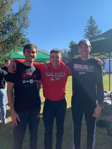 From left to right Assistant Coach Nick “Nico Suave” Engles, Junior Wyatt Miller, and Head Coach Roberto Lara gather after Miller placed 85th with a time of 18:08 on Oct.30 2021.