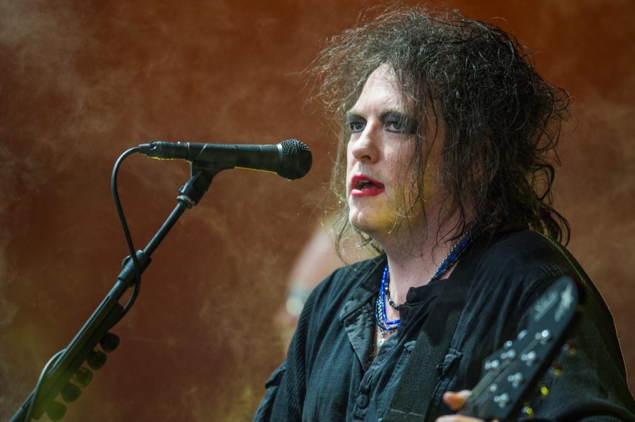 Lead singer of The Cure, Robert Smith preforming