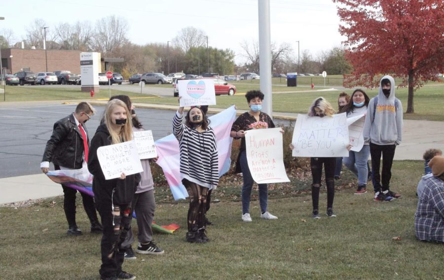 Students gather outside for a peaceful protest for LGBTQ+ rights. The protest occurred on Thursday, Nov. 4 at around 9:30 am. “I want a place where people dont have to be afraid to go to the bathroom, or walk in the halls, or express themselves for who they truly are. I hope that people will be kinder to everyone, especially people who are different,” senior Mateja Clark said.