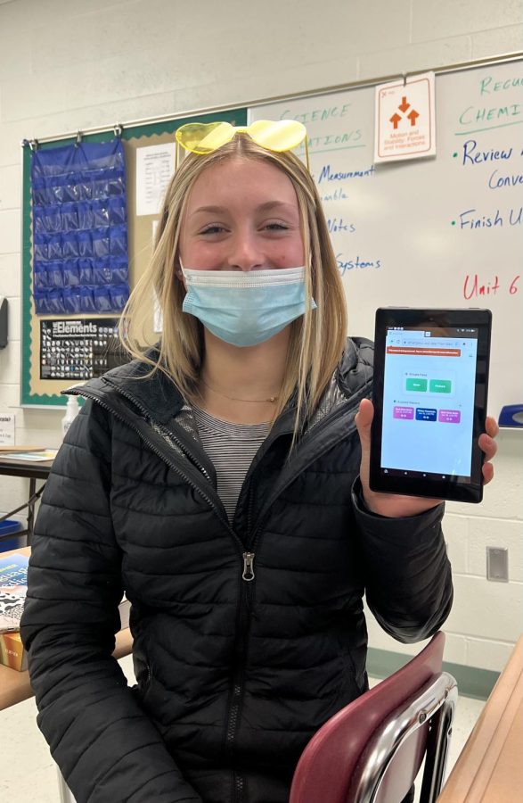 Junior Amber Dretske gets SmartPass ready 
before going to the bathroom. She used her new 
Amazon Fire Tablet that she won during 
Homeroom Olympics. 
