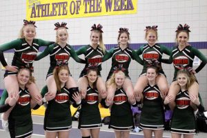 Cheer team gathered for a photo after receiving third place at their first competition. The team is now preparing for their upcoming competitions. “We are a great team and I am very proud of how far we have come this year. Our coaches are the best and we love them,” base Alexis Reabe said.