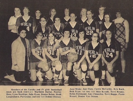 Some of the first female athletics gather for a team photo at Berlin High School. 