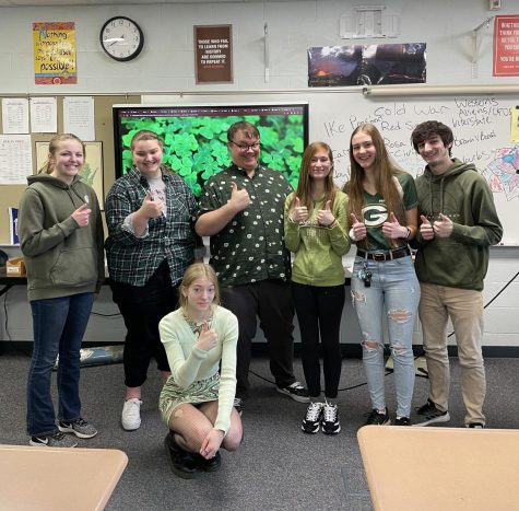 Social Studies teacher Ryan Scanlan and his first hour sociology wore various greens for the day. 