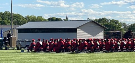 The graduates listen to Principal Bryant Bednarek’s speech about moving on from high school and going the extra mile to get to where they need to go.