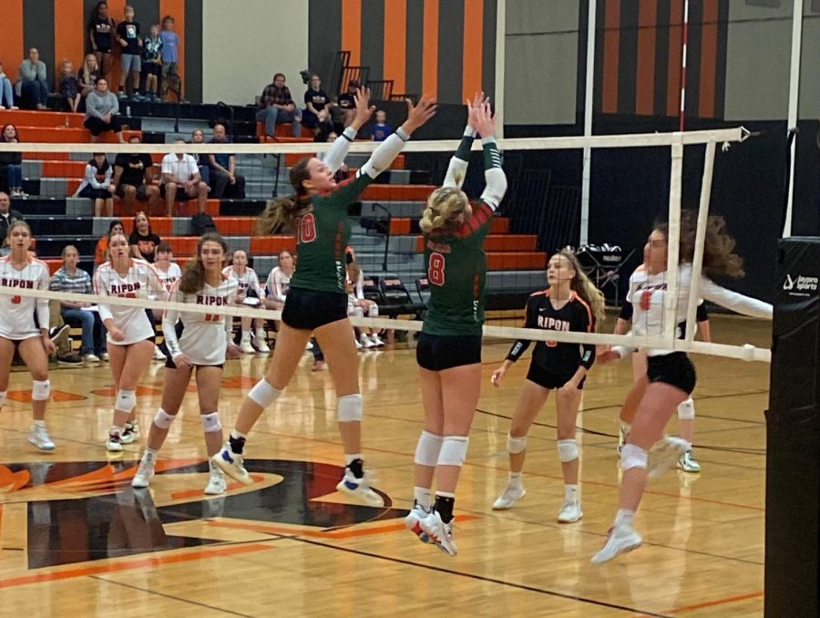 Junior+Claire+Bartol+and+sophomore+Taylor+Scharschmidt+get+in+position+to+block+a+Ripon+hitter.+The+Indians+lost+to+the+rival+Tigers++3-0.++%E2%80%9CWe+had+a+great+plan+to+execute%2C+but+were+not+able+to+get+over+some+initial+bumps+in+the+road+starting+out+and+figured+it+out+way+too+late+in+the+match%2C%E2%80%9D++Head+Coach+Eydie+Reiser+said.%0A