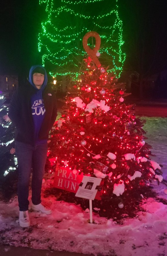 Hunter Boegh ‘22, poses next to the Christmas tree at Nathan Strong Park that his parents decorated for him. There are multiple fundraisers that are happening to raise money for the Boegh Family to help fund Hunter’s treatment. The Berlin Area School District staff recently held a jean day where they raised $1,008 for the Boegh Family. “We decorated a tree for Hunter because he loves Christmas and wont be home for it. I will be having a bin on my side porch full of white ornaments and Sharpies where people can write a note for Hunter on. I will have a small tree that I will put up in his room where I will hang those ornaments,” Hunter’s mom, Kris Boegh said. 