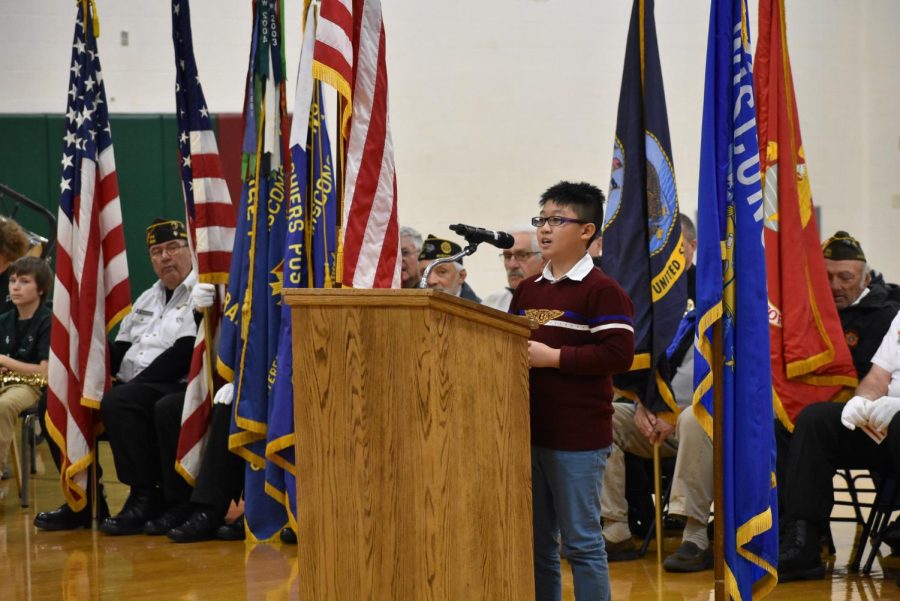 Clay Lamberton student Travis Pham gives his speech at the Veterans Day program to the entire district. 