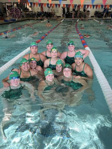 Girls swim team competes at conference