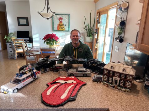 Marshall poses with all of his Legos. His most recent addition to the collection was the Rolling Stones Tongue. 