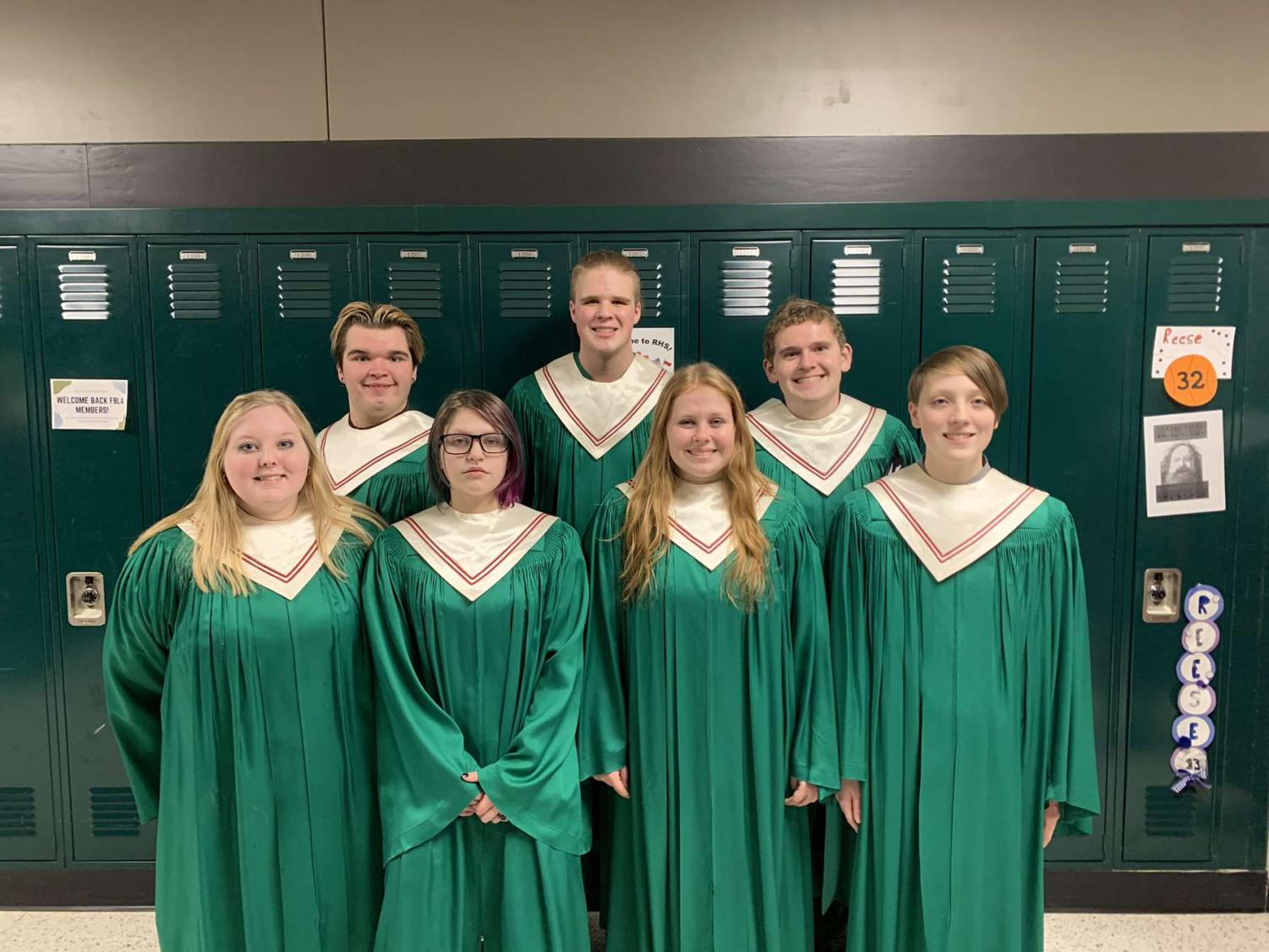 ECC Honors Choir students in their choir robes before their performance.