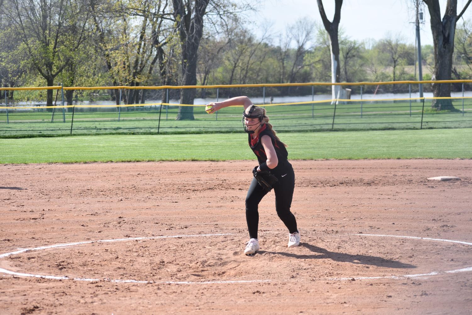 Junior Jenna Nigbor pitches against the Ripon Tigers during the second inning. Berlin lost by just a few points, the final score was 7-9.