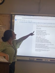 New English teacher Emily Humy instructs her Early American Literature students to write a ‘Where I’m From’ poem during class. “I love explaining literature or an English concept and watching the lightbulb go off in someone’s head,” Humy said.