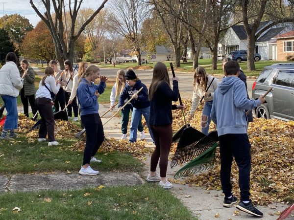 NHS and Key Club went around town on Nov. 2 and raked peoples leaves. “NHS and Key Club have done this in the past, but not since Ive been an adviser,” Suzanne Wood said. Some brought their own rakes and Wood brought a bucket of rakes. 