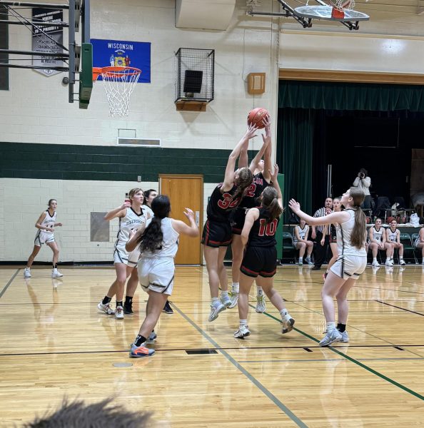 Junior forward Callie Kurczek vies for the rebound. Their next game is tonight. 