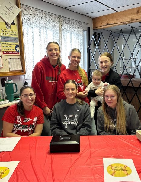 Members from the softball team working the money table at the pancake breakfast on March 9.