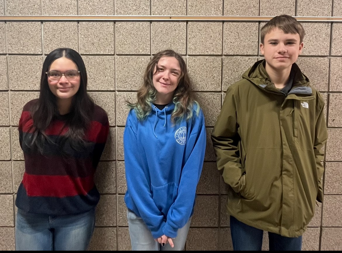 The winners from the 10th annual Short Story Contest. In the middle is senior Arianna McCormick who won first place. On the left is junior Tasi Ana Sanchez who won third place, and on the right is freshman Ewan Steffen who won second place.