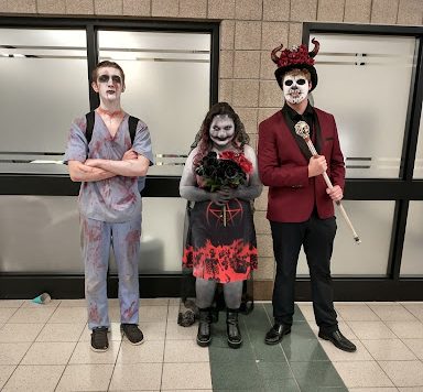 The winners of the Halloween Costume Contest are pictured above. First place Ella Santori is featured in the middle. Aden Armstrong on the left placed second, and Aidan Pierstorff on the far right placed third.