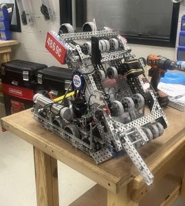 This year's VEX Robotics Club machine is designed to grab a stake and add rings to it. The more rings placed on different steaks the more points earned.