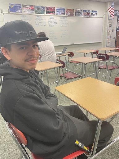 Senior Javier Valtierrez wears his classic black attire.Valtierrez is an FFA member and likes  animals. He likes to listen to music and work.