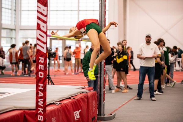 Freshman Selci Sirrell jumps over the bar at Ripon College on April 4. At an earlier meet in Ripon College on March 20 she broke the 5’3.5” record of Berlin High School that was set in 1996. Sirrell’s record is now 5’7”. 