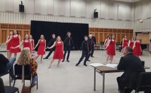 Show choir performs their two song routine at state Solo and Ensemble at UW-Oshkosh on April 26. The group went on to score the highest possible mark of one. 
