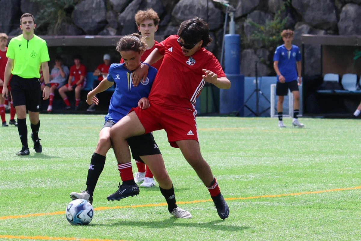 Freshman Josue Valtierrez Rodriguez (in red) has been playing soccer since the 2nd grade and has played for teams such as Wisconsin International Soccer in Spain and the YMCA. Valtierrez Rodriguez participated in last summer’s Donosti Cup held in Spain. Valtierrez Rodriguez shares his favorite aspects of Spain.  “The beaches, all the stores and the food,” Valtierrez Rodriguez said. 