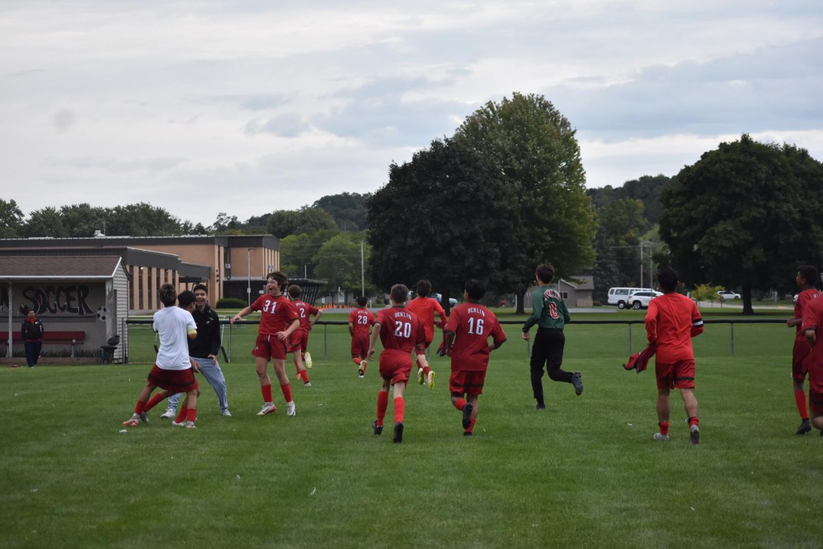 The Team celebrates after beating Coulee Christian to attain their third win in a row. “It's all the kids' work, you know? I try to teach what I can, and they are starting to learn by themselves,” Coach Alex Deleon said.