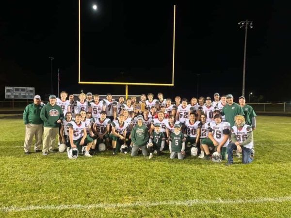 The football team receives their plaque after their win against Adams-Friendship last season. They look to do the same Friday night, bringing them closer to another conference championship.


