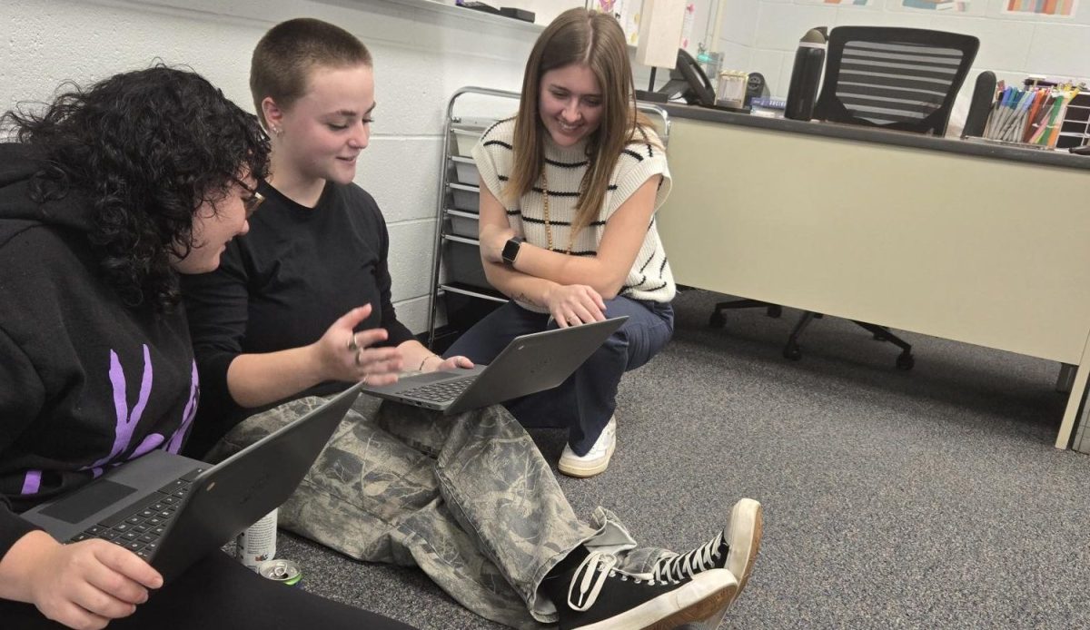 Seniors Aubrey Meyer and Ella Santori work on their Native American Research Presentation. "I love working with Ms. Schultz! Even though it’s her first year, she isn’t afraid to 'set the law' and make sure kids are doing what they’re supposed to," Meyer said. 