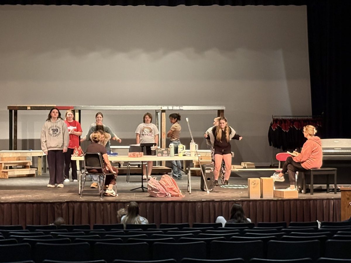 Musical Director Abbe Lane spent many rehearsals focusing on learning the music with piano before incorporating dances. “I like the funny practices when we’re kind of just goofing around and getting our songs memorized,” junior Abby Shattuck said.