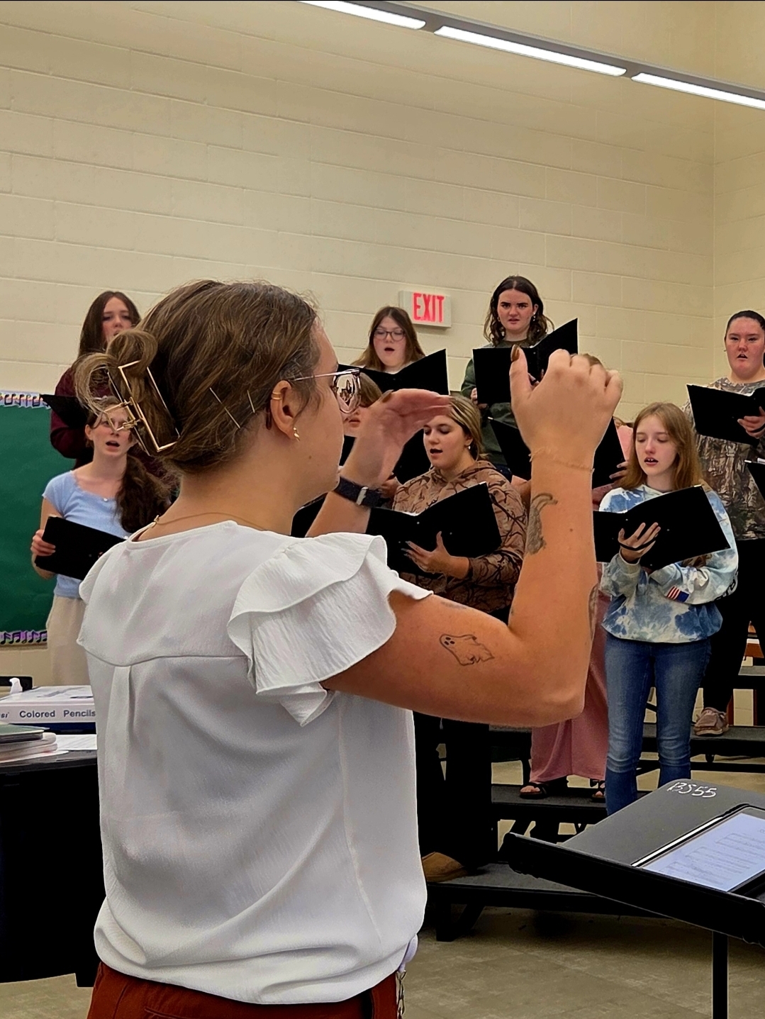 Choir Director Abbe Lane directs her fifth hour mixed choir. With their first concert being in December, BHS choir rehearses songs months in advance. 