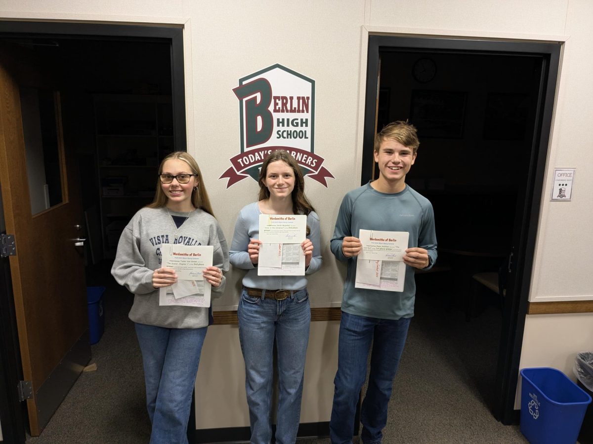 Wordsmiths awards prize money for the 11th annual short story contest. First place goes to sophomore Ewan Steffen, second place goes to freshman Sarah Majeskie, and third place goes to junior Taylor Van Ornum.