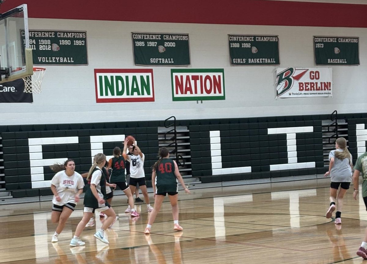 The team runs through offense near the end of practice. The girls' work has really focused on togetherness as they prepared for their first game. “Our coach is very positive and has high expectations for us. Over the summer we worked on more individual skills, practices are now focused on team game and plays,” guard Becca Bartol said.