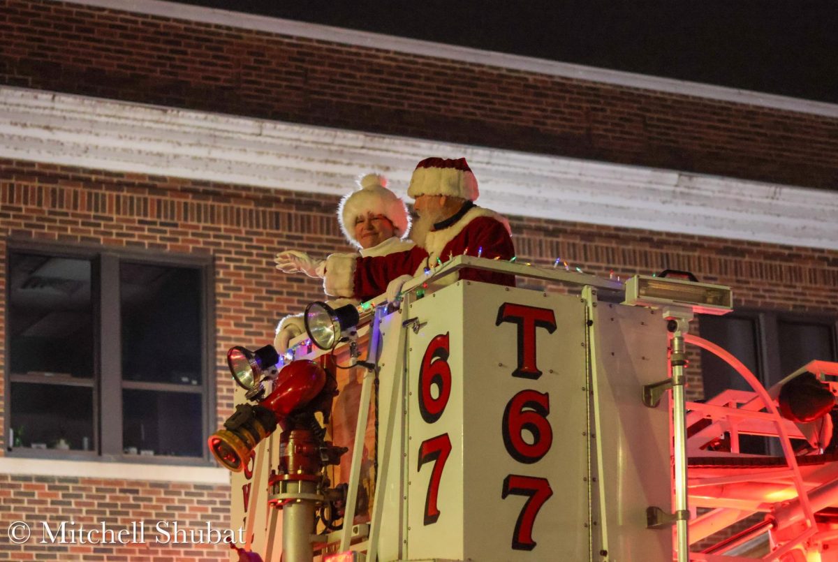 The big man himself, Santa, led the end of the parade this past Thursday, Nov. 20, with his leading lady Mrs. Claus. They sat on top of the Berlin Fire Department fire truck so that all could see the pair wave.