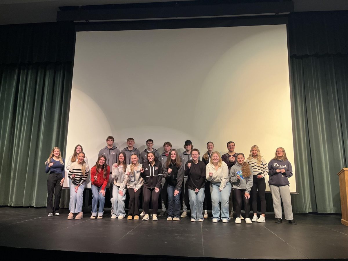 Seniors show off their second academic bar, awarded to them on Dec. 11, 2025. “These bars make you feel good about yourself. My parents are always big supporters, and they push me to do my best,” senior AnnaMae Clinch said.