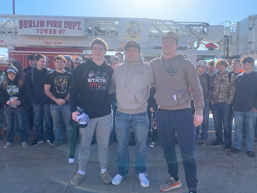 From left to right: junior Ben Green, senior Jakob Martin, and Coach Beau Yineman head to the state wrestling competition in Madison, Wisconsin. 
