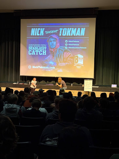 Nick “Sunshine” Tokman and junior Lexi Holt enjoying the moment in the auditorium. Students were asked to come up to dance and not care what others had to say. Lexi bravely went up there and danced with a whole audience cheering them both on. "Lexi was an amazing highlight, be more like Lexi," Tokman said. 
