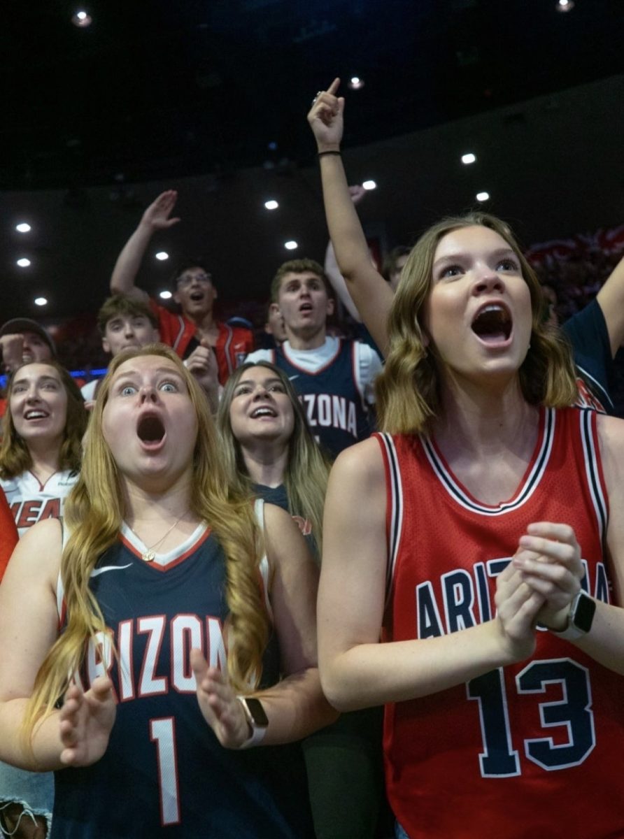 Aluma Aleea Lichtenburg "25" drops her jaw in excitement at an University of Arizona basketball game.