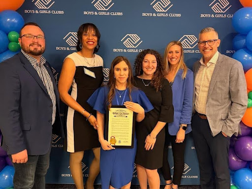 Left to right: State Representative Alex Dallman, The Boys and Girls Club Graduation Specialist Eydie Clark Resier, senior Hailey Rodriguez, The Boys and Girls Club Berlin Area Director Madyson Main, The Boys and Girls Club Director of Development Ashley Bartol, The Boys and Girls Club CEO Jason Presto.