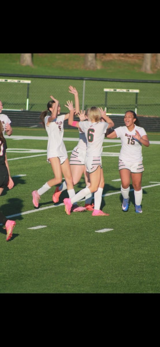 Freshman Adalynn Hilgart, sophomore Addison Thoma, sophomore Elizabeth Schmidt, and freshman Ahzayla Bell come together on the field and celebrate their goal against Ripon on April 16 on the Ripon field. The team came together and decided they needed to get the win against Ripon because of the previous year's loss. "I know we won, but I can’t wait to play them again,” Hilgart said. Berlin girls' soccer has its next game away, on April 28, against Amherst High School.