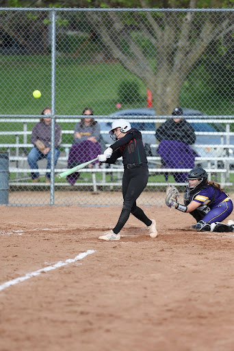  Senior Lakelyn Sobieski makes contact with the ball against Sheboygan Falls during their first playoff game at Berlin against Sheboygan. Reflecting on years of growth and experience throughout her four years, it slowly starts to become a bittersweet experience. 
