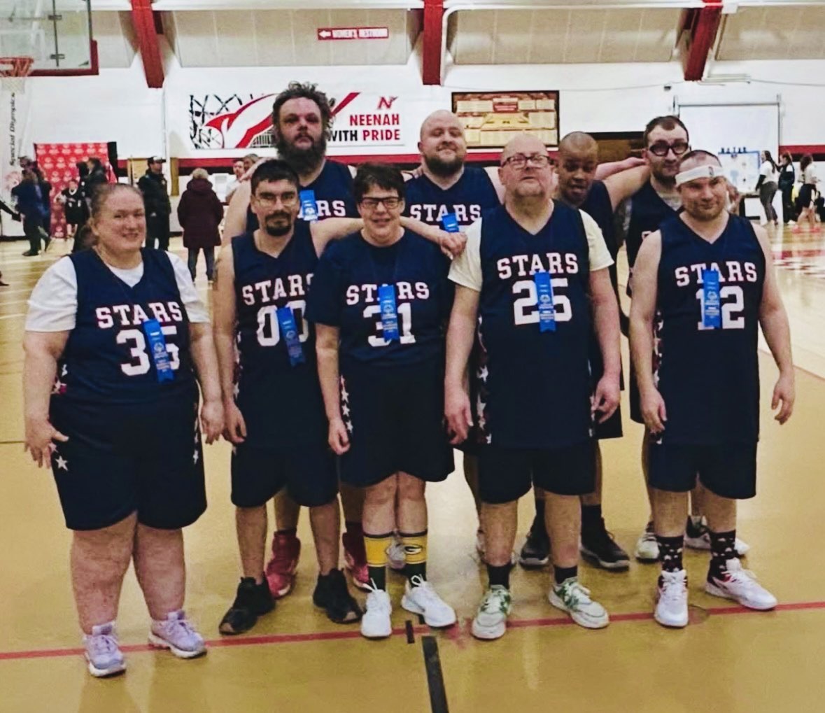 The Green Lake County Special Olympics Basketball team, “Stars 2,” gathers after qualifying for the state meet on March 1. “State is a whole different level of energy. The atmosphere is electric — bigger crowds, more teams, and a lot of pride from athletes, families, and coaches. For some of our newer athletes, competing at state is something they’ve dreamed about, and being there gives them a huge confidence boost,” coach Toby Trochinski said.
