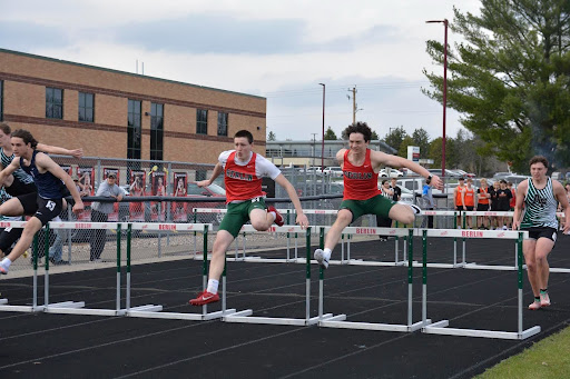 Berlin’s Tresten Sirrell and Matt Przybyl sprint the 110-meter hurdles at the Berlin Quad. Sirrell had a time of 18.09 seconds, and Przybyl had a time of 19.21 seconds.